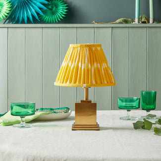 Walter rechargeable table lamp with an antiqued brass finish