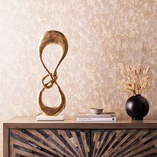 Knotty sculptural table lamp in gold and white marble