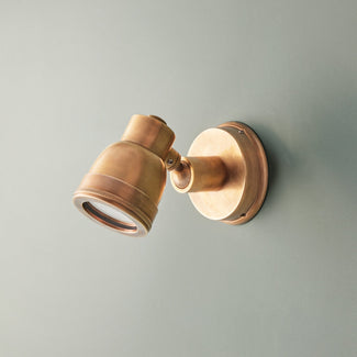 Cellato IP54 wall light in brass